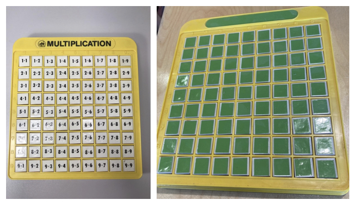 Two machines. Each is made of yellow plastic with nine rows of nine buttons. The machine on the left has products of one-digit numbers on each button, from 1x1 in the upper left to 9x9 in the lower right. The machine on the left has shiny green tape covering those numbers so that all 81 buttons look identical to each other.